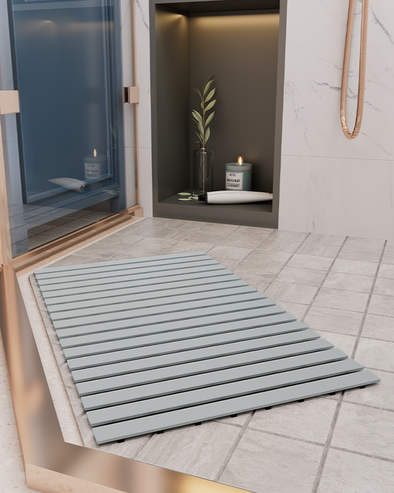 Non-slip rubber heavy-duty shower mat, curlable and quick-draining.