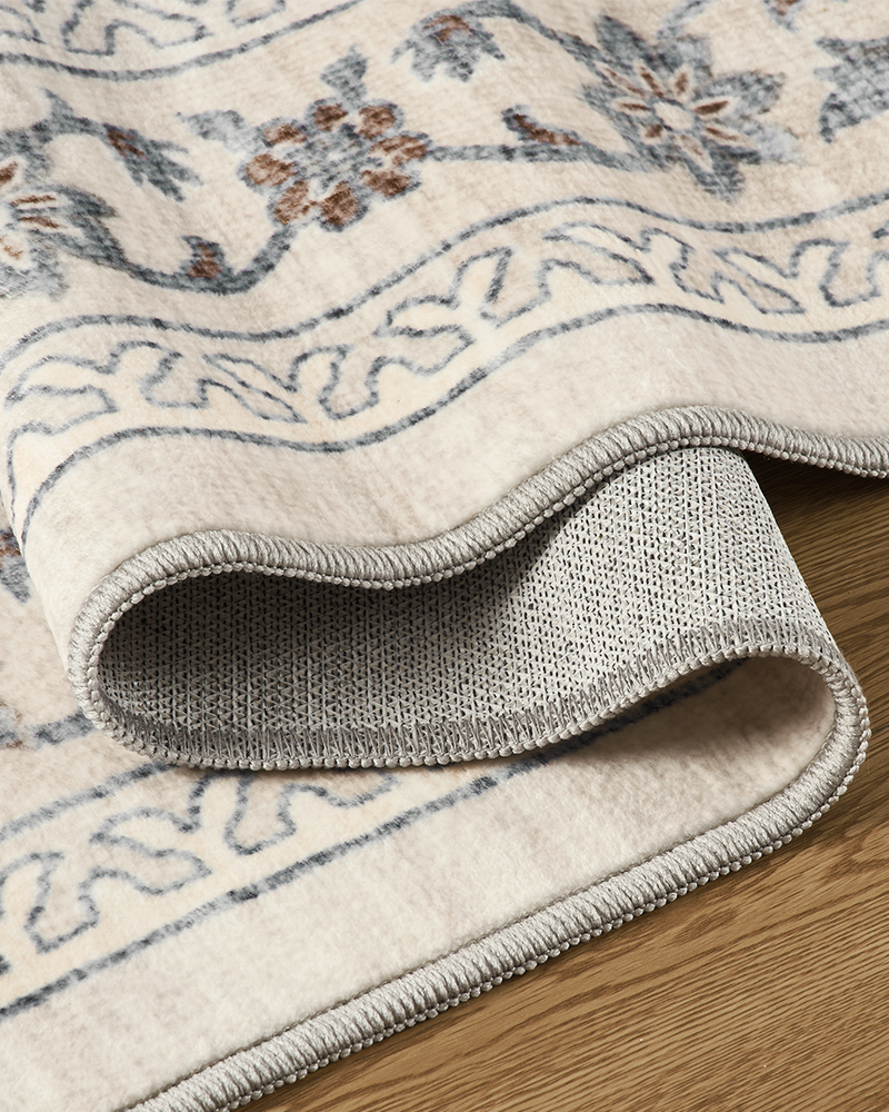 Washable beige vintage carpet, timeless home decor piece.
