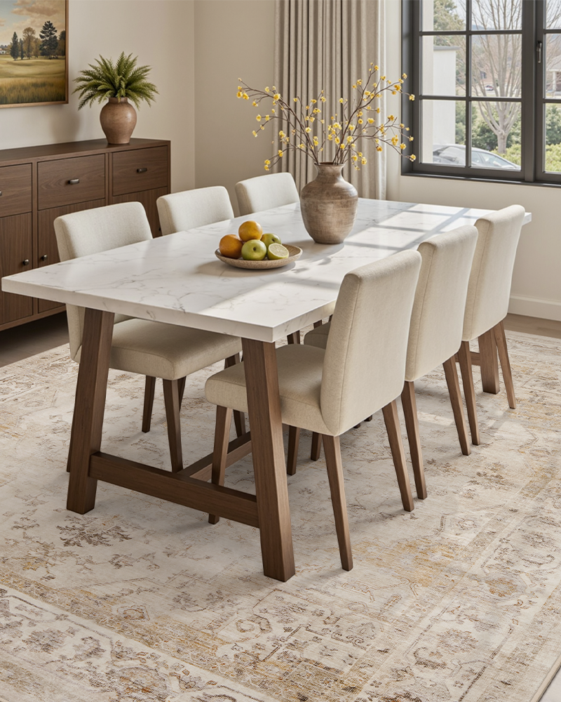 Washable soft beige rug with fine texture, ideal for dining area.