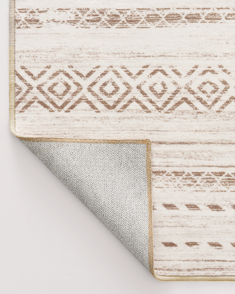 Vintage-style Moroccan rug with warm texture and soft surface, ideal for cozy spaces.