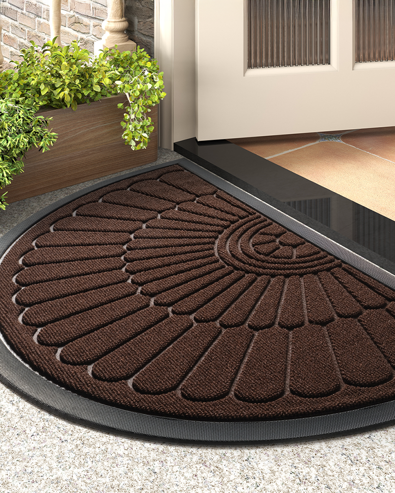Semicircular non slip rubber door mat for outdoor and indoor entryways.