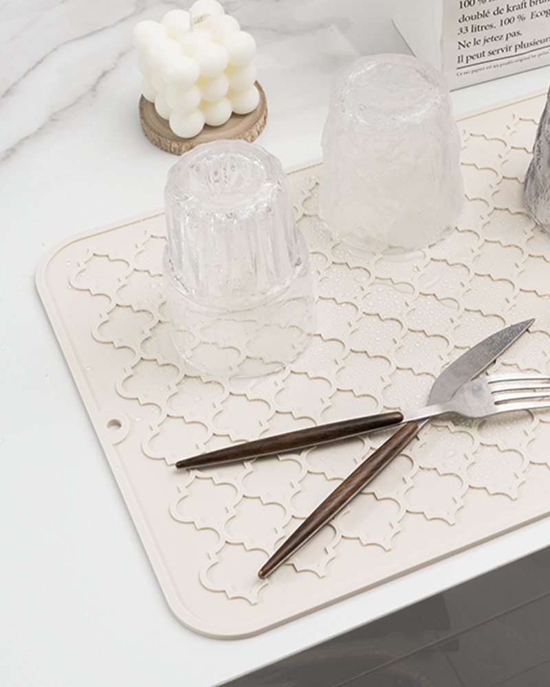Rubber-backed silicone dish drying mat that stays firmly in place near the sink.