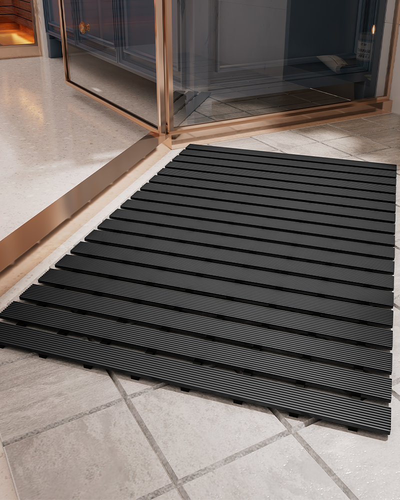 Sturdy heavy-duty shower mat with rubber backing, non-slip and easy to clean.