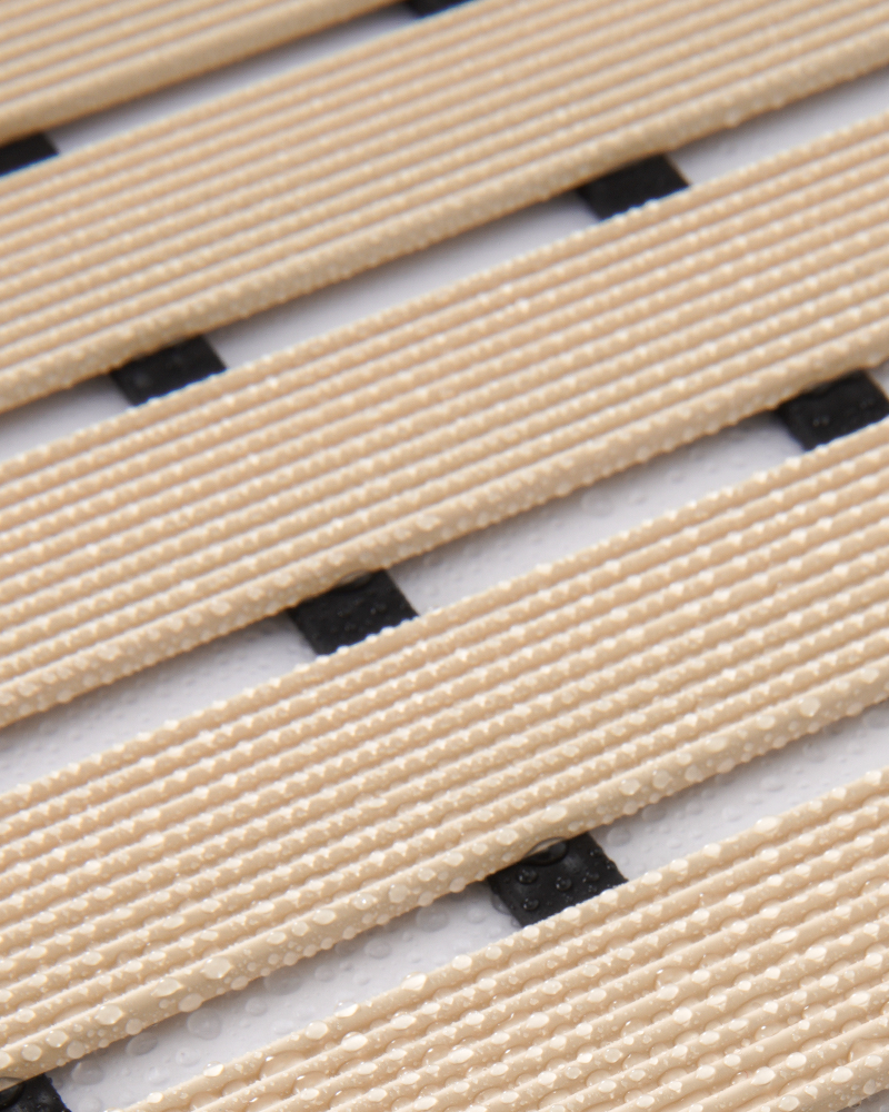 Non-slip heavy-duty shower mat for indoor use, durable and curlable.