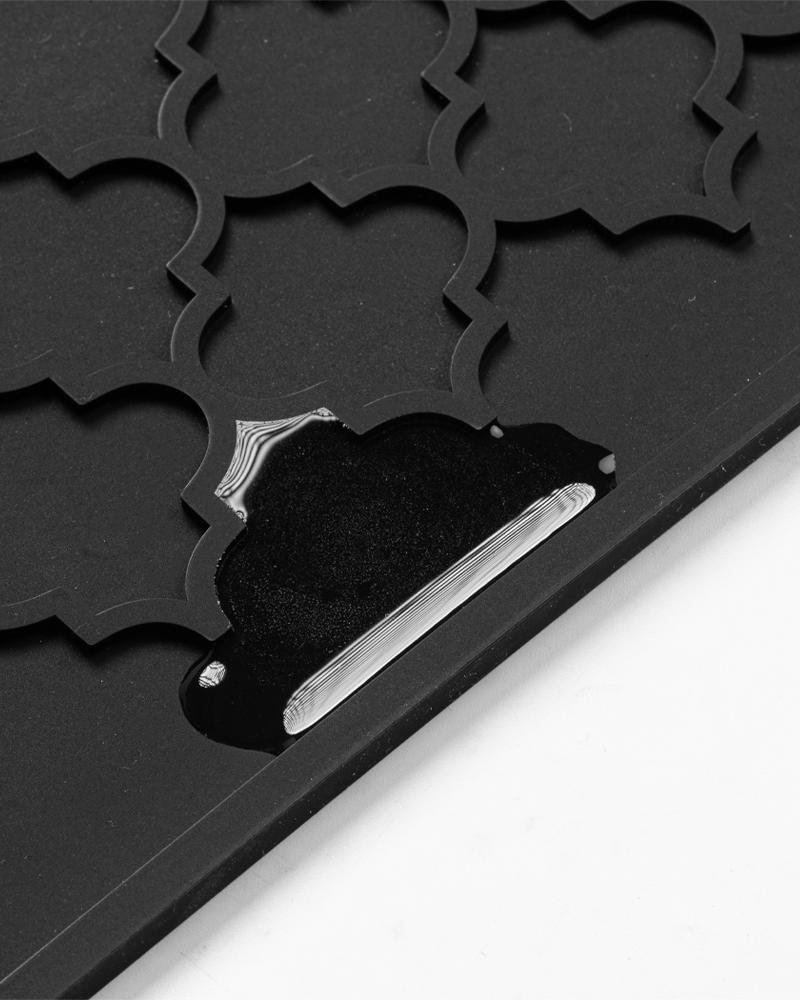 Multi-purpose silicone mat for kitchen and bathroom use, durable and quick-drying.