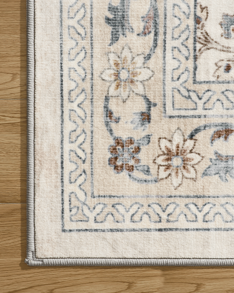 Beige distressed vintage rug for living room, washable and pet friendly.