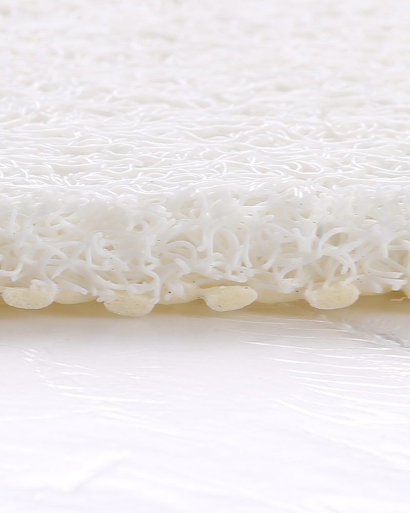 Quick-dry shower mat, PVC loofah design, non-slip and safe for family use.