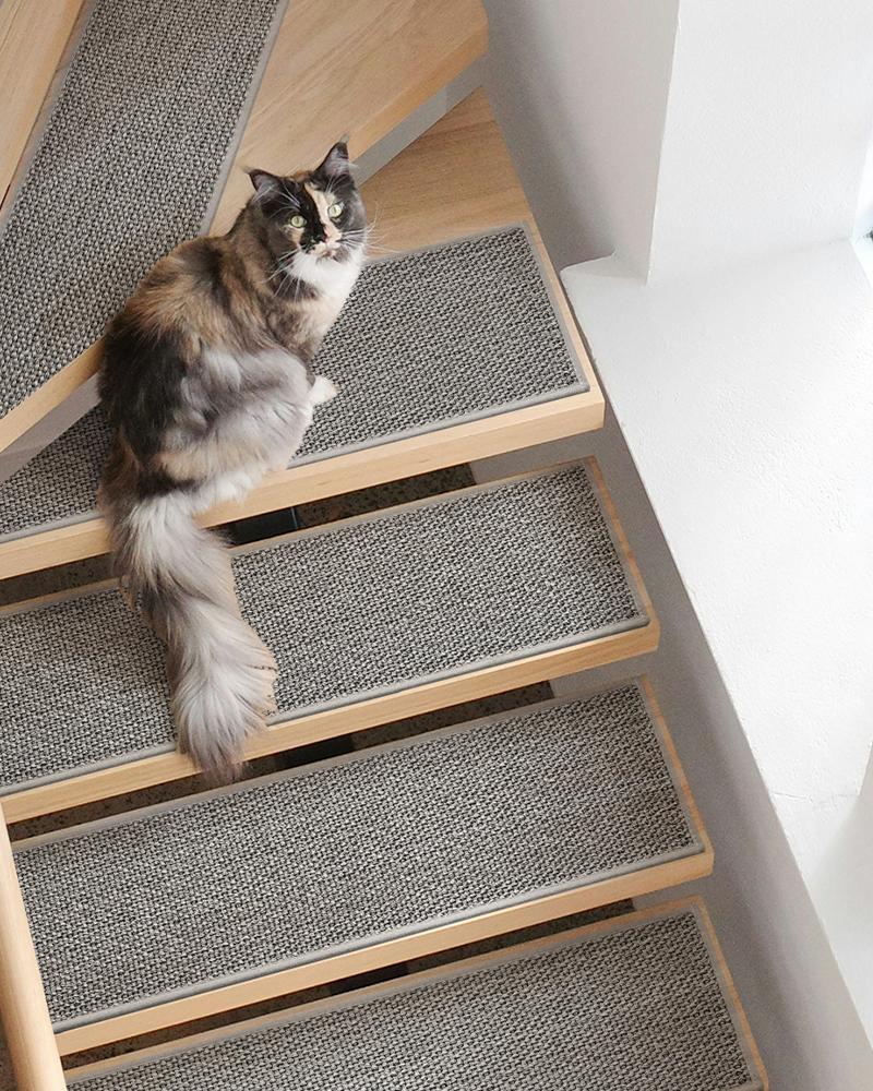 Pet-friendly stair treads made of durable rubber backing for traction and comfort.