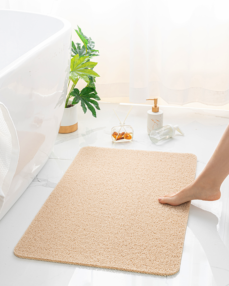 Quick-drying PVC loofah bath mat, comfortable and non-slip for safe shower use.