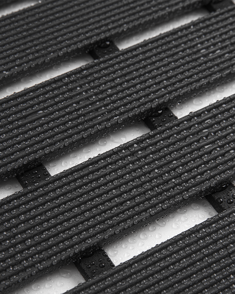Rubber heavy-duty shower mat for bathroom, non-slip and curlable for indoor/outdoor use.