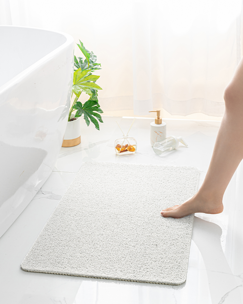 Bath tub PVC loofah mat, non-slip with lattice backing and soft cushioned top.