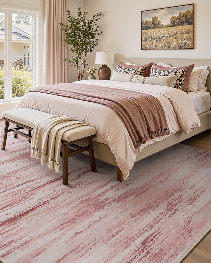 Non-slip kids playroom rug with abstract pink design, washable.