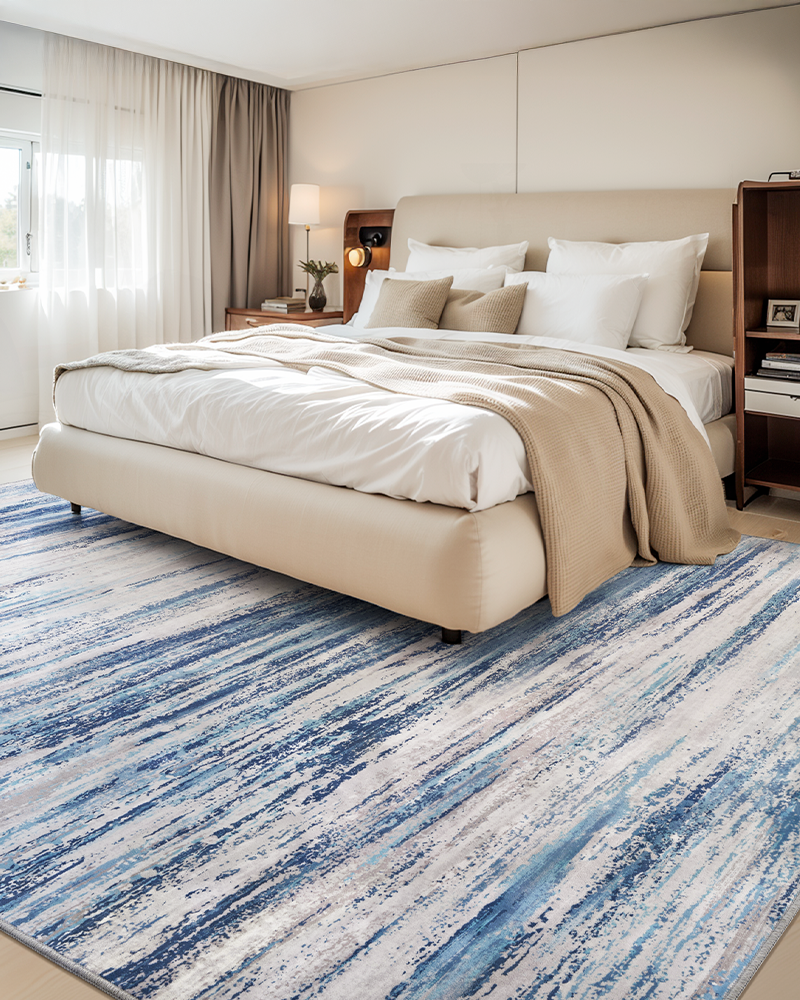 Soft non-slip nursery rug, washable with blue abstract texture.