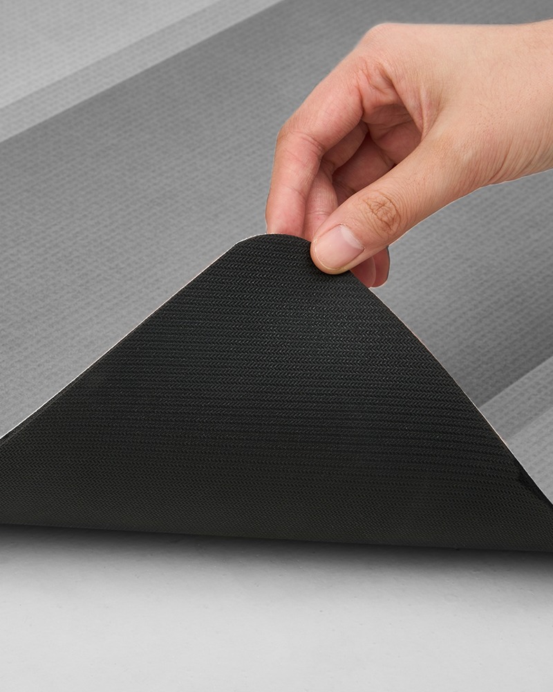 Bath mat suitable for laundry room and RV spaces, combining quick absorbency with space saving design