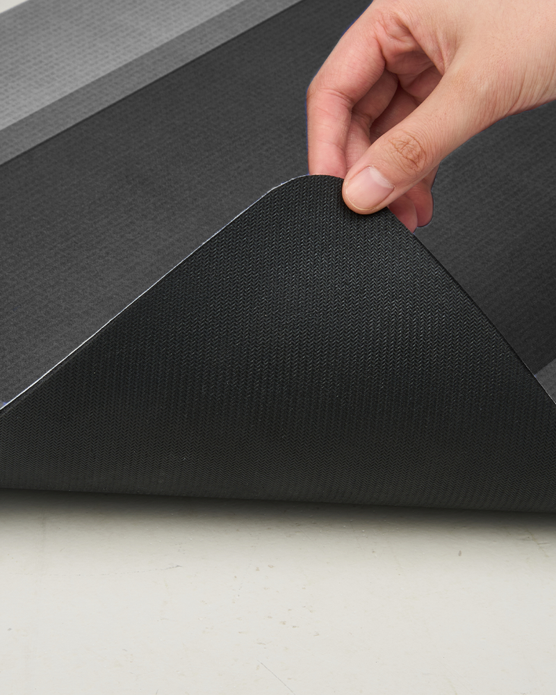 Bath mat crafted without fabric pile to avoid shedding and simplify cleaning routines