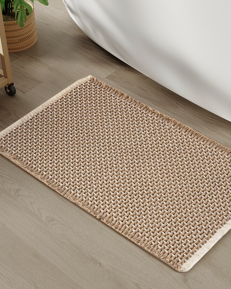 Bath mat suited for apartment and condo bathrooms with frequent daily use