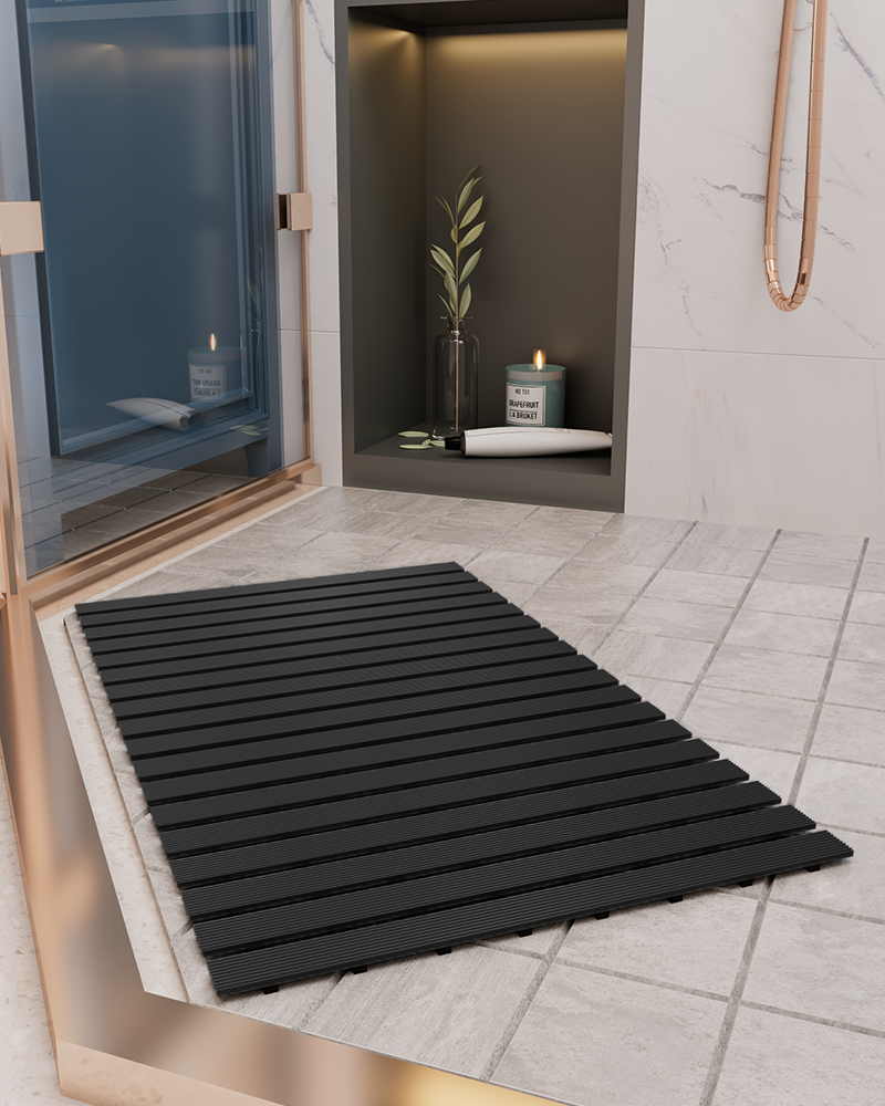 Bath mat with built in drain channels to keep feet dry and comfortable