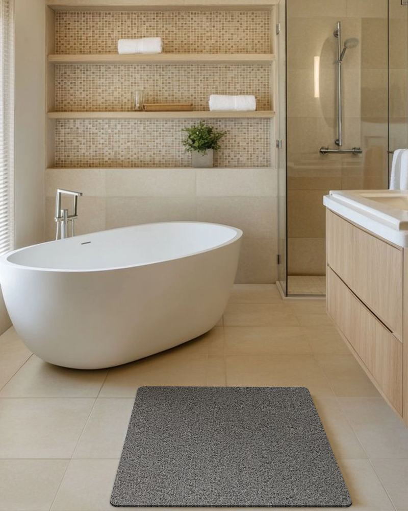 Bath mat with a subtle massaging texture that enhances relaxation after showers