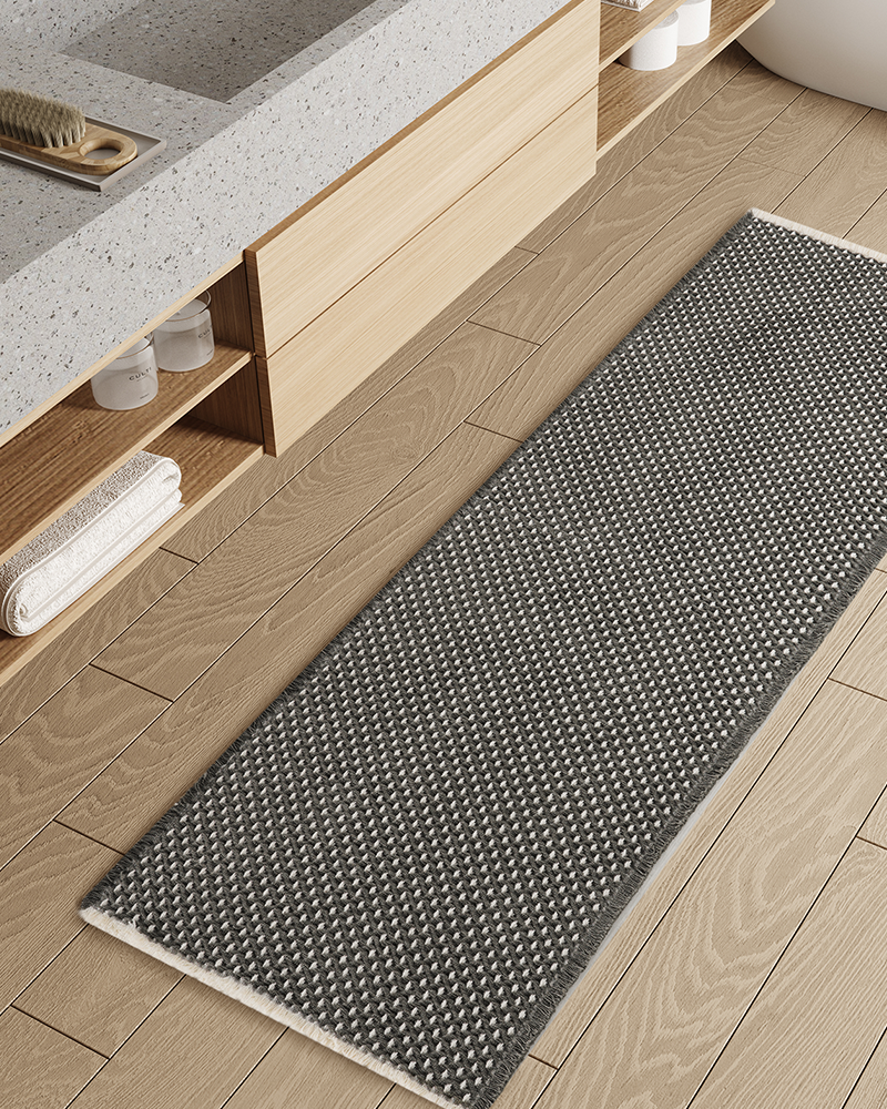 Bath mat with reliable non-slip backing securing grip on wet bathroom floors