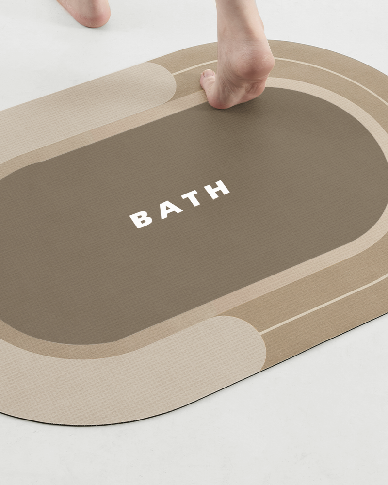 Bath mat with rubber backing designed to stay secure on wet floors without shifting or curling