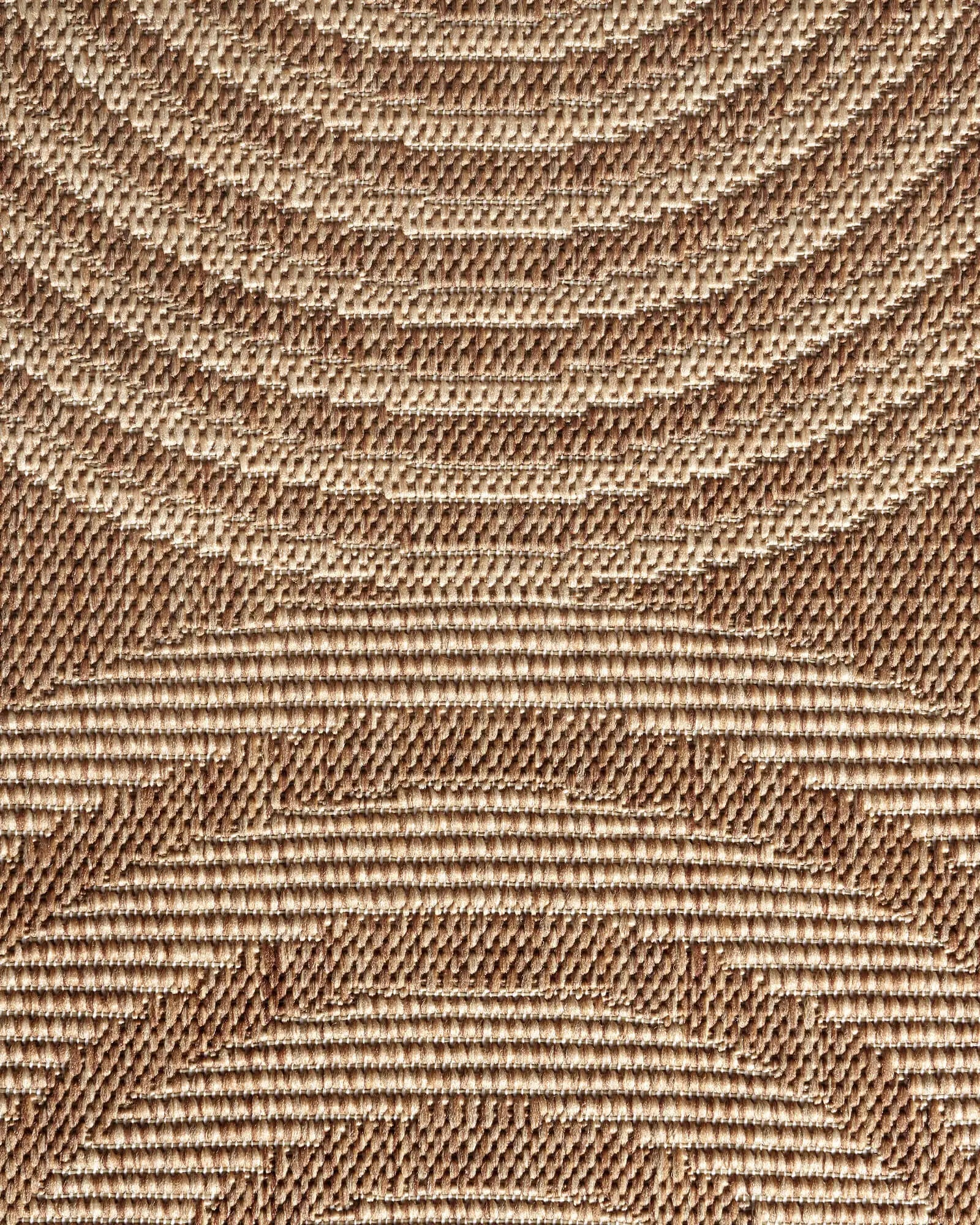 A close-up view of a brown abstract outdoor rug highlights its raised arch line texture, woven surface, and durable weather-resistant design for patios, decks, porches, and outdoor living spaces.