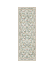 This vintage floral area rug creates a warm layered look in the family living room while offering a soft surface for everyday lounging.