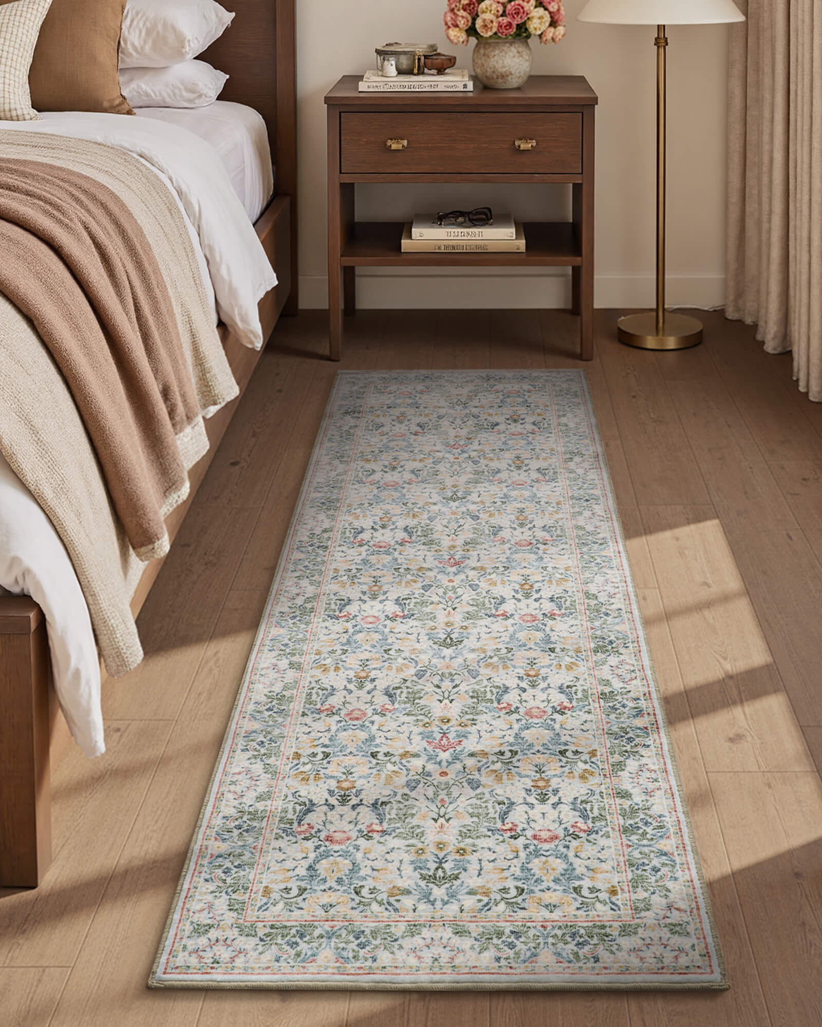 This floral area rug adds a soft and inviting touch to the living room with a washable surface and non slip backing that works well for family life.