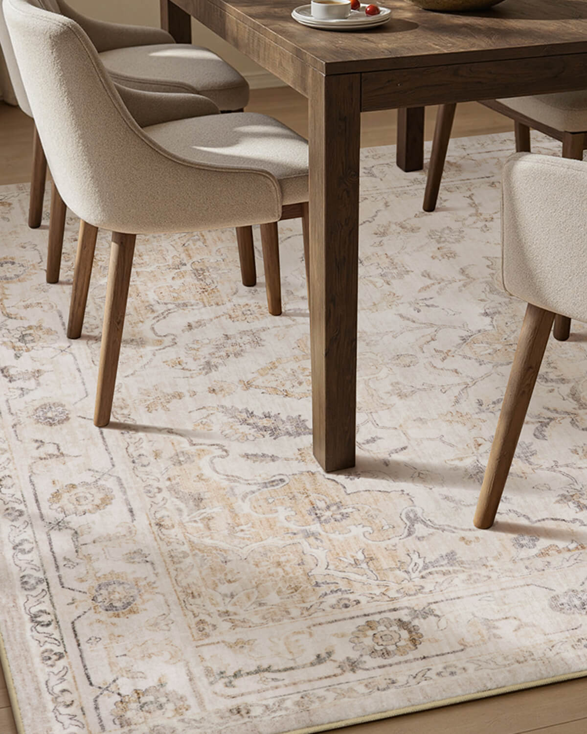 Floral vintage washable area rug designed for layered modern living spaces