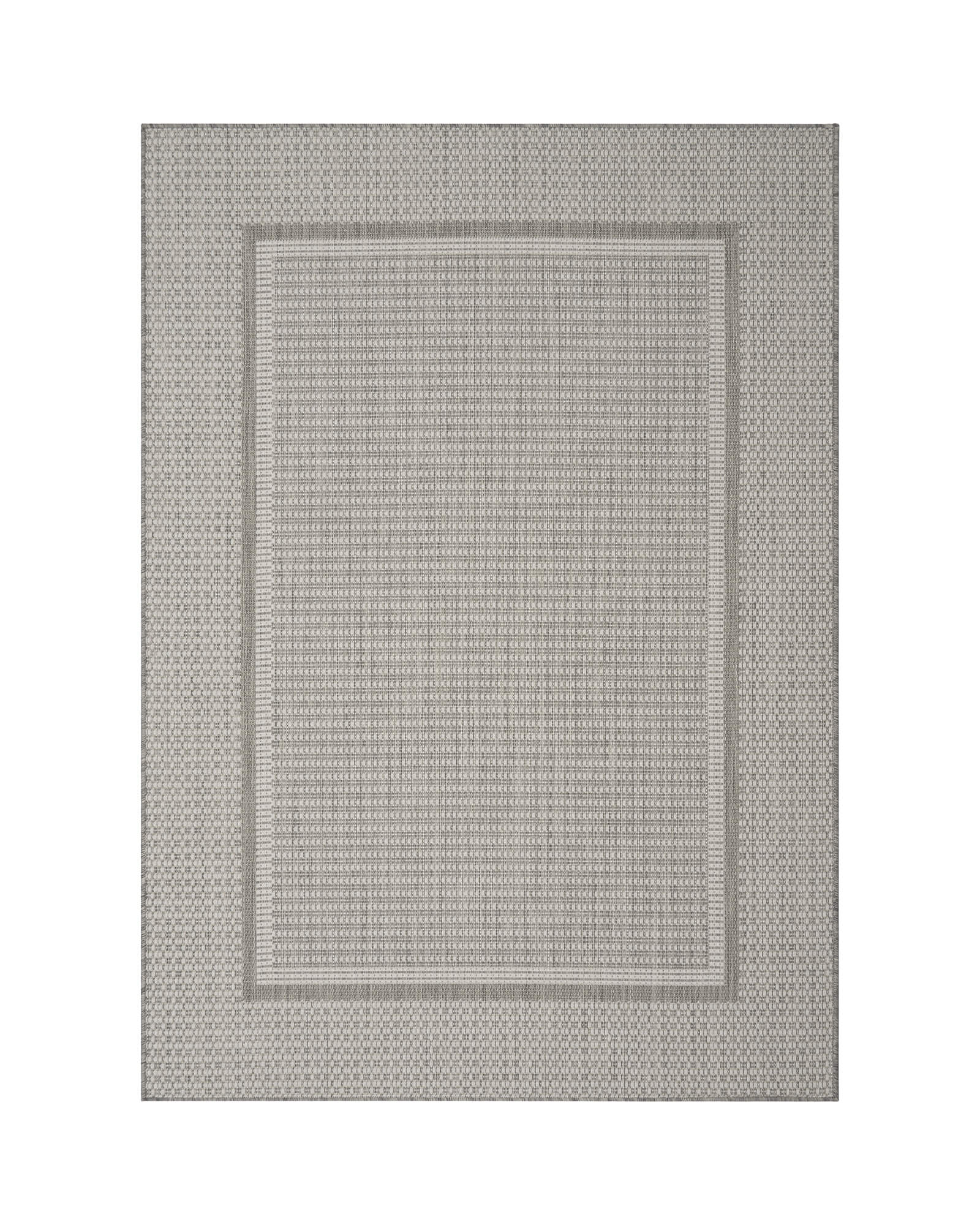 A gray woven indoor outdoor rug features a durable jute-look texture and subtle border design, adding easy-care style to patios, porches, sunrooms, dining areas, and high-traffic living spaces.
