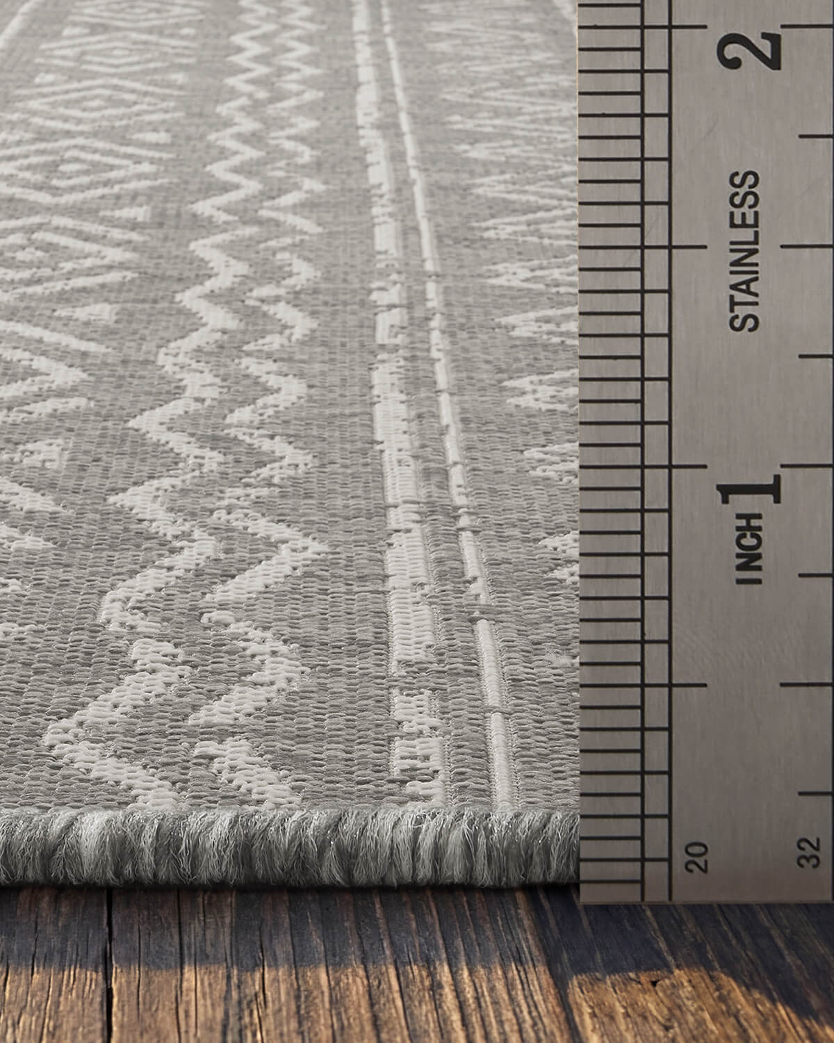 Indoor outdoor rug with durable woven texture made for comfortable indoor outdoor living and easy maintenance