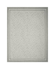 Faux jute indoor outdoor rug with relaxed vintage inspired style and practical everyday durability