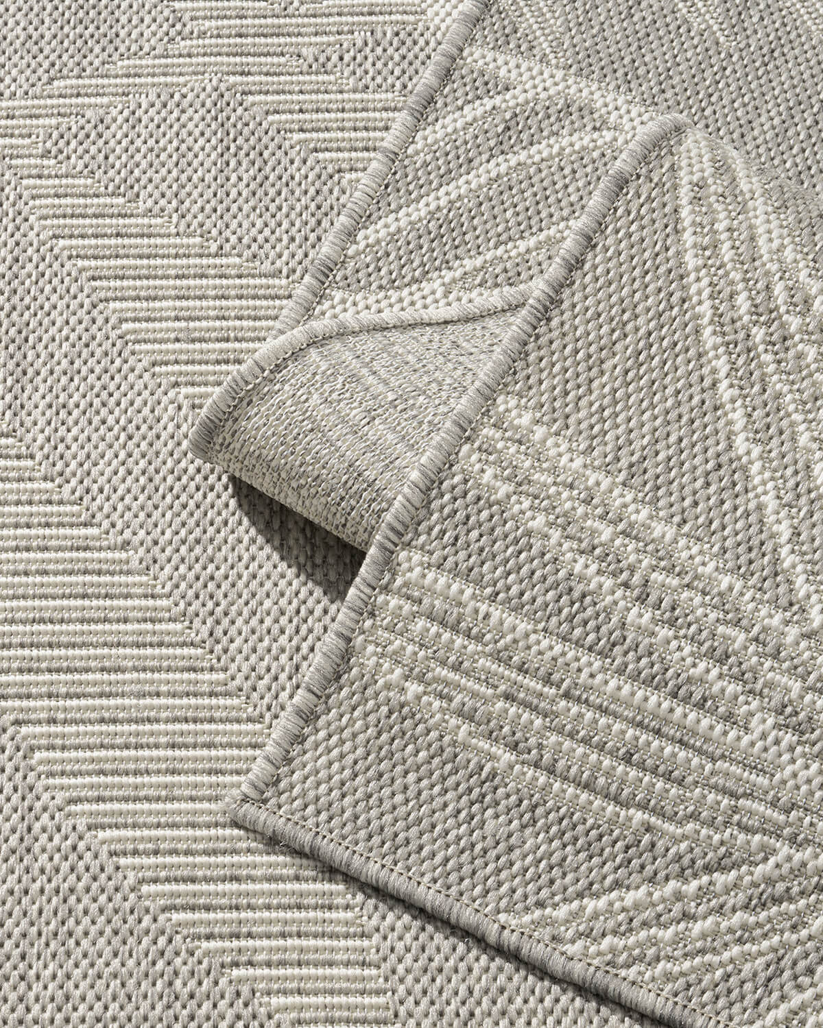This indoor outdoor rug is a useful layer for an outdoor entryway with weather ready materials and easy care that suit a busy household.