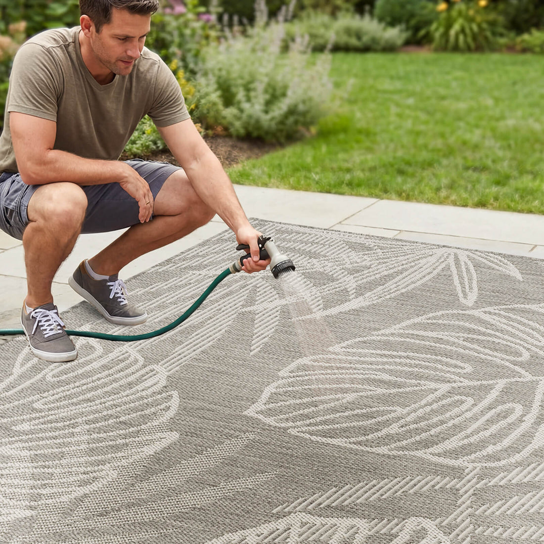 Anchoring a covered patio furniture area, this indoor outdoor rug provides fade resistant protection and dependable durability for everyday use.