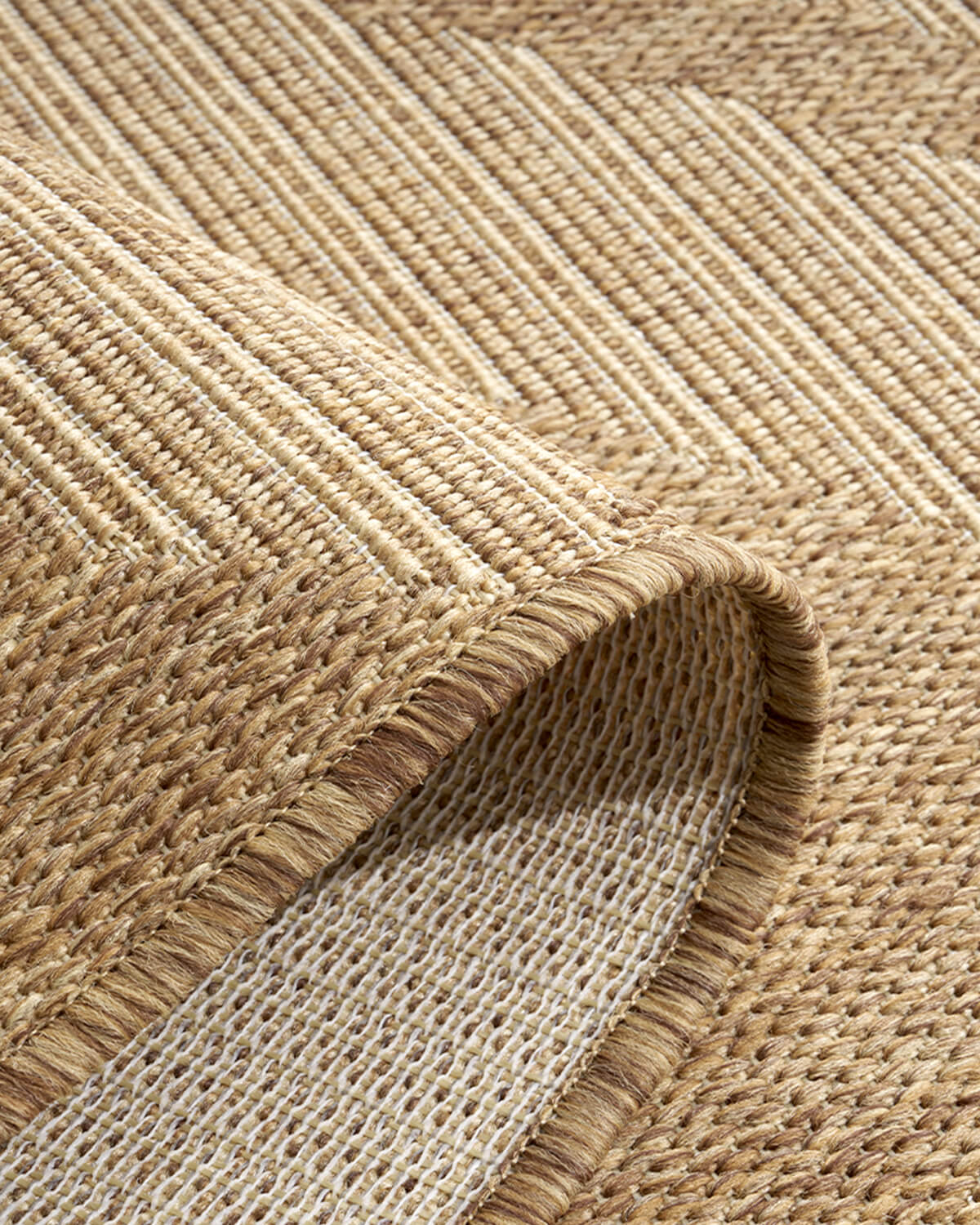 Indoor outdoor area rug suitable for patios balconies and living rooms with versatile design