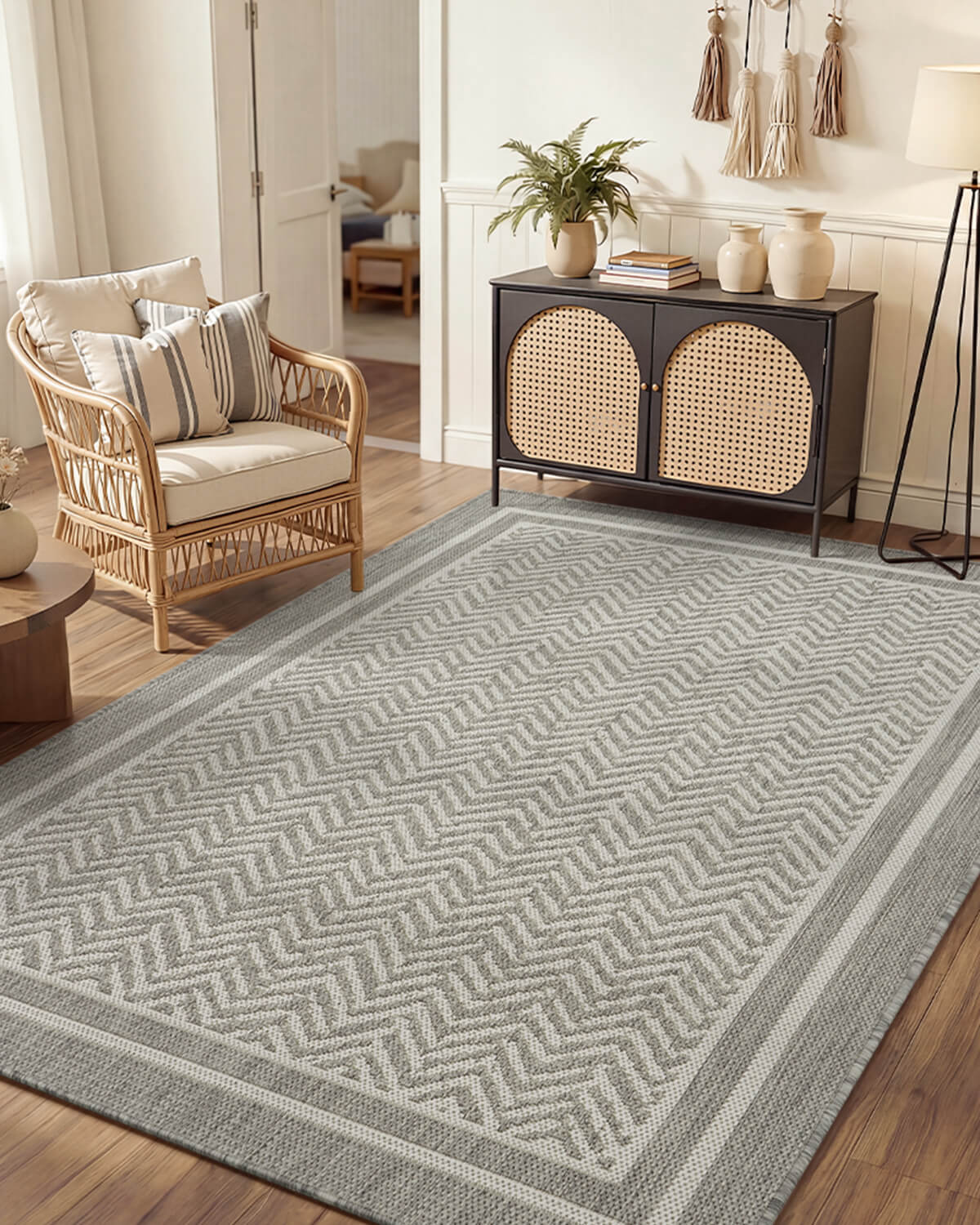 Indoor outdoor rug featuring decorative scrollwork for modern patio and outdoor lounge spaces