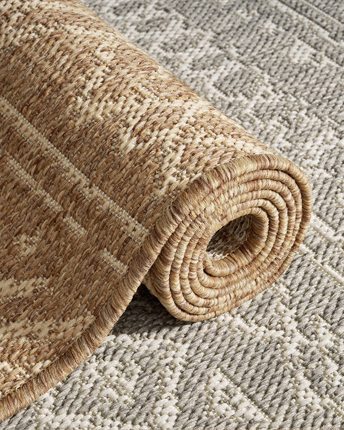 Textured indoor outdoor rug providing soft comfort for busy family homes and active everyday living