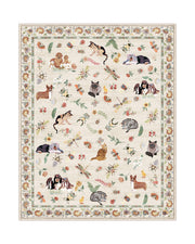 An ivory soft kids area rug features cute animal, butterfly, floral, and garden-inspired illustrations with a decorative border, creating a cozy and playful surface for nurseries, playrooms, and children’s bedrooms.