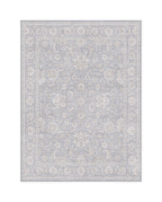 A light blue vintage washable area rug features a faded ornamental medallion pattern, delicate border details, and a soft low-pile design for elegant bedrooms, living rooms, and cozy home decor.