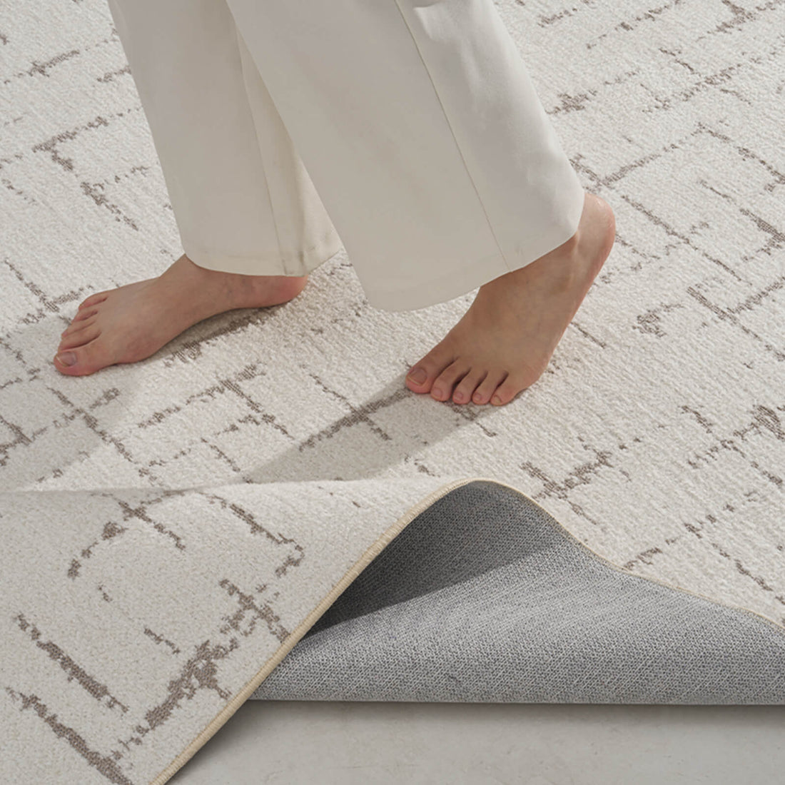 This abstract line area rug is designed for high traffic living spaces with durable construction and a soft finish that feels comfortable underfoot.