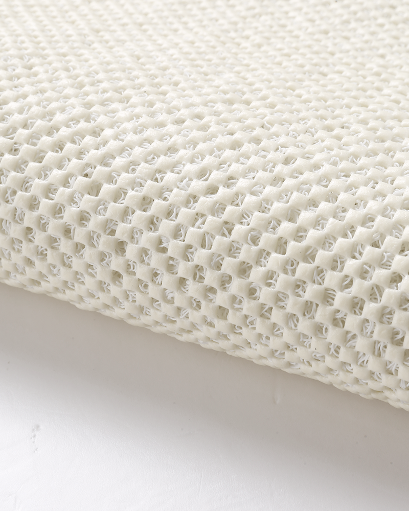 Loofah bath mat featuring a drain through design for improved hygiene