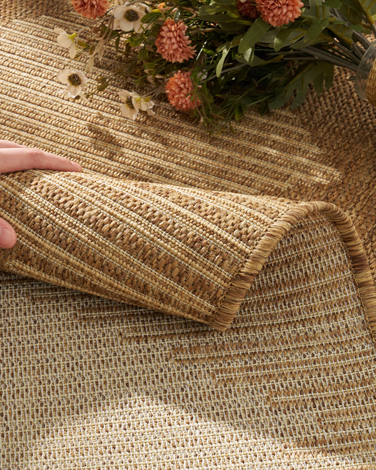 Soft indoor outdoor rug providing comfortable support for indoor and outdoor living areas