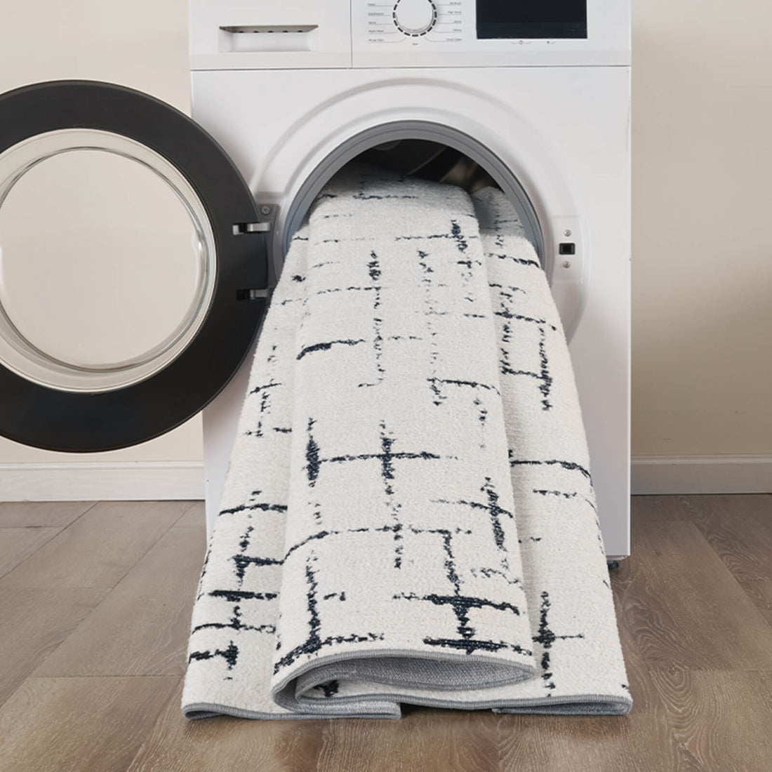This modern line area rug is a practical choice for a family space with non slip backing, easy care maintenance, and soft comfort underfoot.