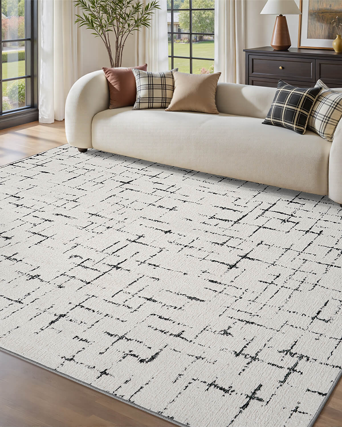 This geometric line area rug brings modern pattern and washable durability to the family living room for a look that feels both stylish and practical.