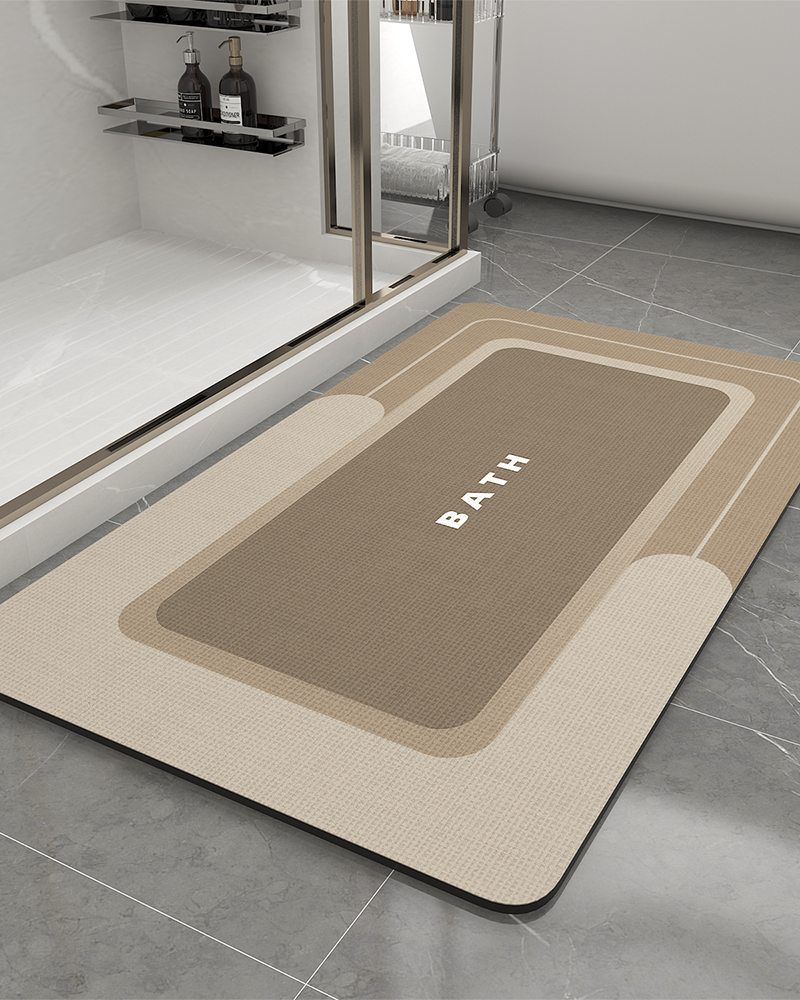 Thin, quick-drying bath mat with anti-slip feature, designed for bathroom safety and comfort.