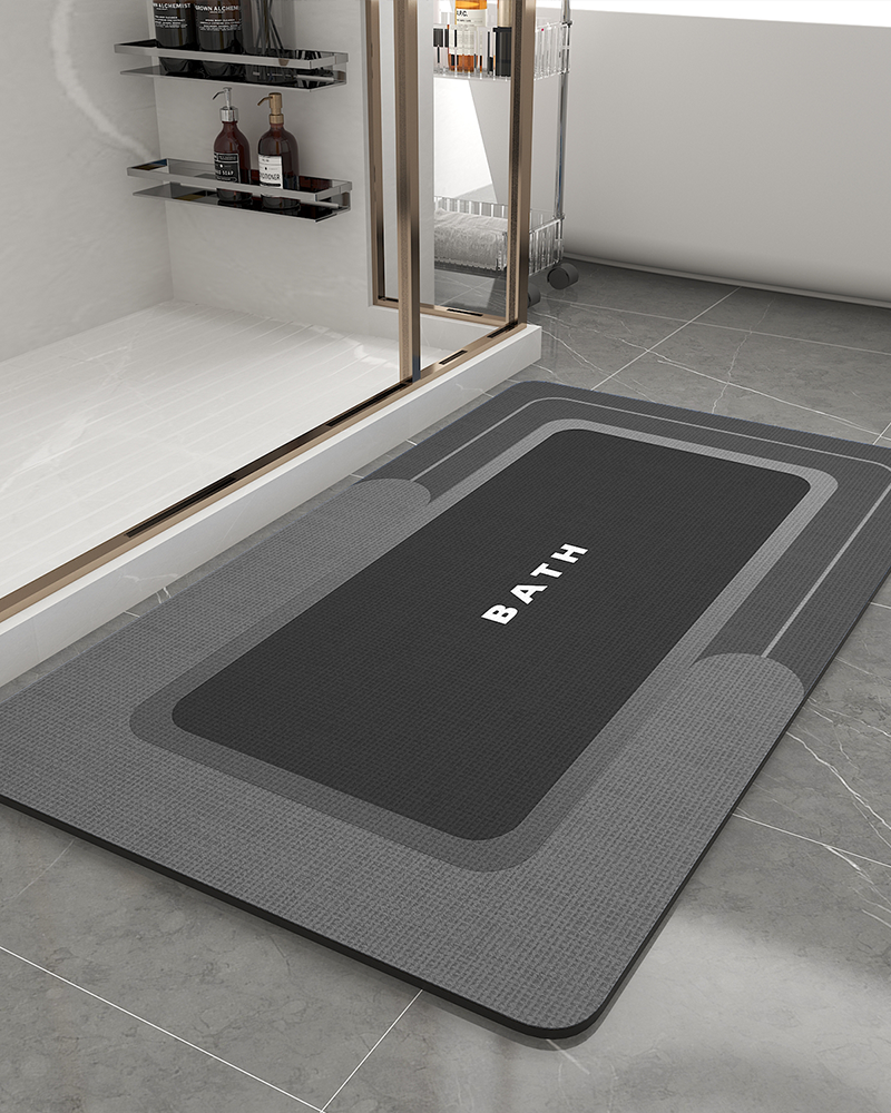 Thin, non-slip bath mat with quick-drying, highly absorbent for bathroom floor protection.