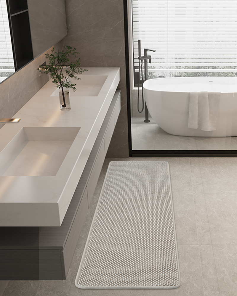 Quick-dry chenille bath rug with low-pile design, beige and white, non-slip and absorbent.