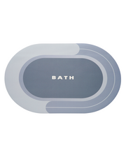 Non slip round bathroom mat that grips smooth tile floors securely, reducing slip risks in wet areas