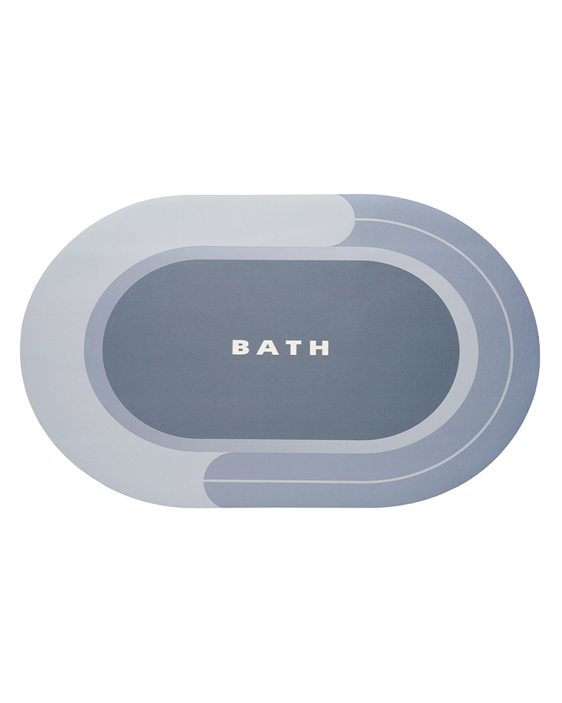 Non slip round bathroom mat that grips smooth tile floors securely, reducing slip risks in wet areas