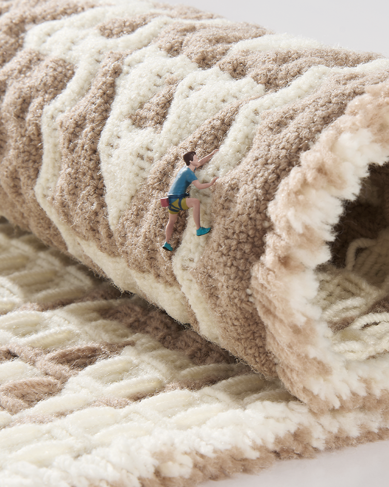 Absorbent soft waffle bath mat with tassels, ideal for bathrooms and vanities.