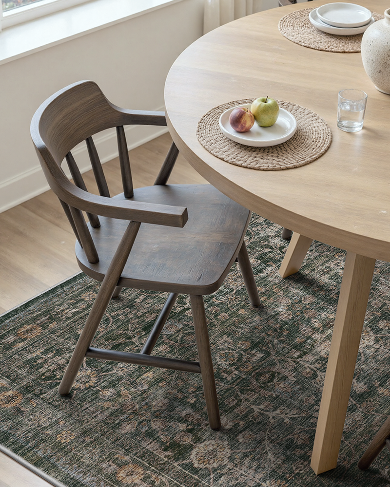 Neutral green vintage rug, soft textured floor decor for multiple rooms.